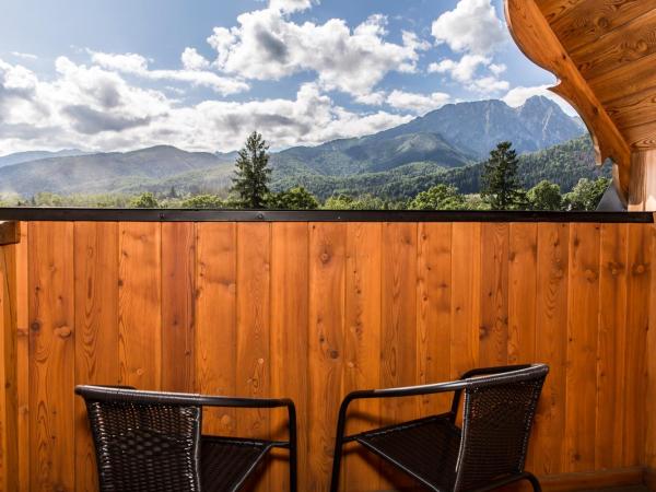 Royal Hill Residence : photo 9 de la chambre appartement en duplex - vue sur montagne