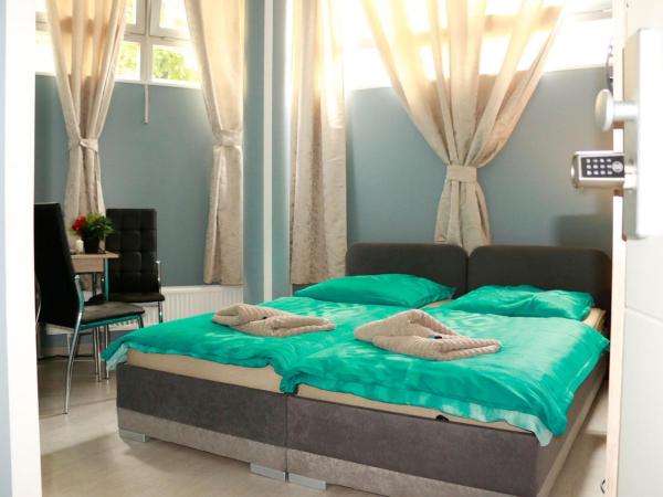 Amaya Motel : photo 1 de la chambre chambre lits jumeaux standard avec salle de bains commune