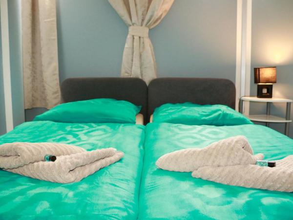 Amaya Motel : photo 2 de la chambre chambre lits jumeaux standard avec salle de bains commune