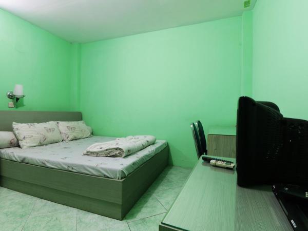 Wisma Aam Syariah : photo 3 de la chambre chambre double
