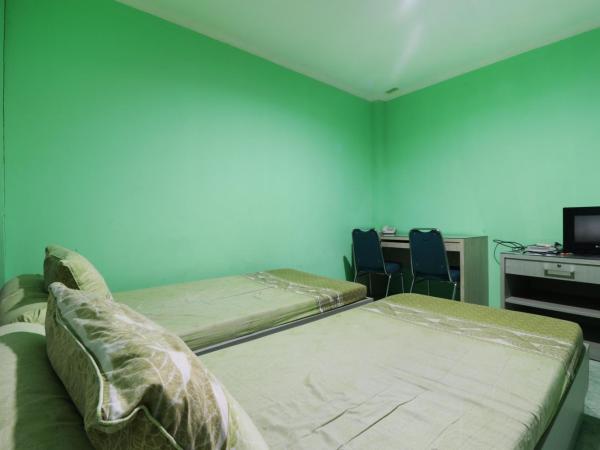 Wisma Aam Syariah : photo 6 de la chambre chambre lits jumeaux