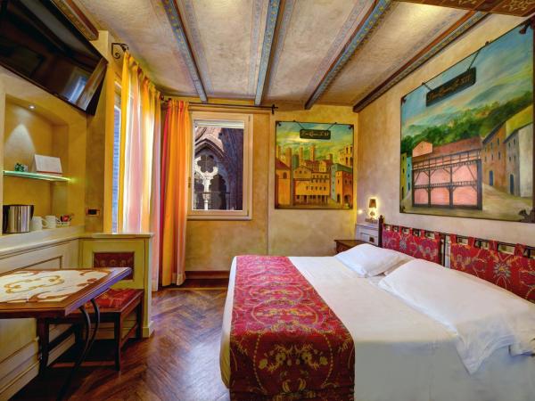 Art Hotel Commercianti : photo 1 de la chambre chambre double ou lits jumeaux avec terrasse