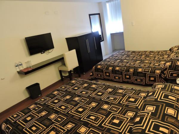 Hotel Granada : photo 1 de la chambre chambre double supérieure avec deux lits doubles