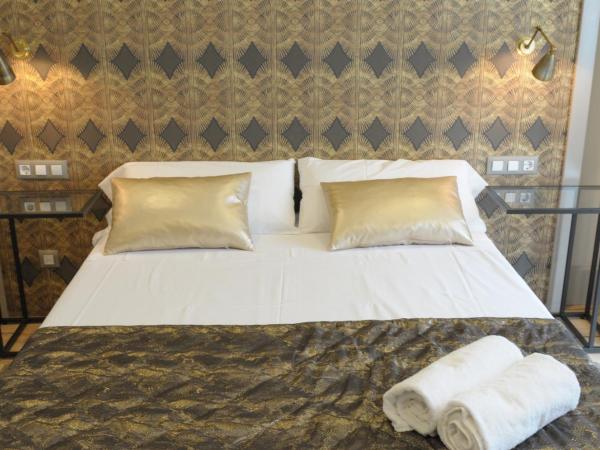 Casa Balmes : photo 10 de la chambre chambre double avec lit d'appoint – vue sur cour