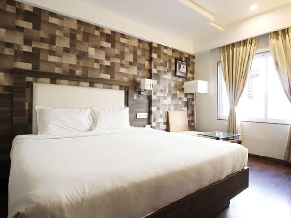 Hotel Aaram Orchard : photo 6 de la chambre chambre deluxe double ou lits jumeaux