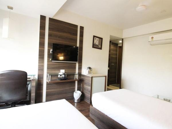 Hotel Aaram Orchard : photo 5 de la chambre chambre deluxe double ou lits jumeaux