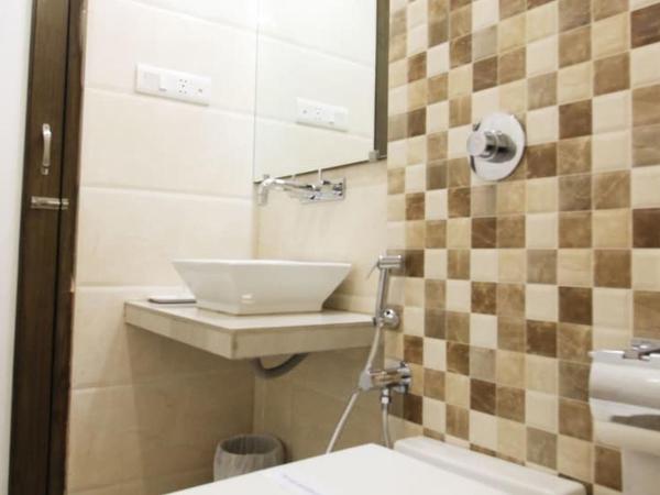 Hotel Aaram Orchard : photo 6 de la chambre chambre double ou lits jumeaux exécutive