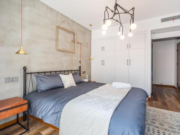 Qingdao Shibei·Qingdao Carrefour· : photo 5 de la chambre appartement avec balcon