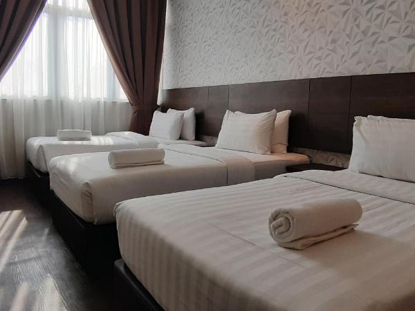 MIICO Hotel @ Mount Austin : photo 2 de la chambre chambre triple avec vue