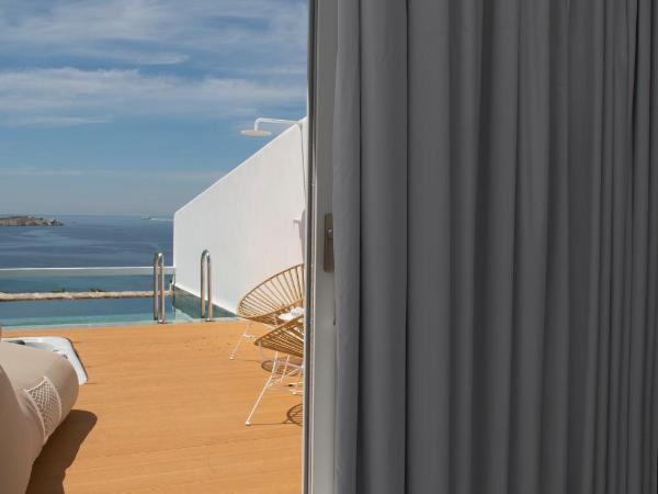 Mykonos Bay Resort & Villas : photo 5 de la chambre suite privée artistique de luxe avec jacuzzi extérieur et piscine privée - vue sur mer - annexe
