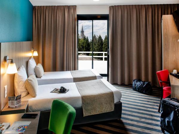 Hôtel Panorama : photo 1 de la chambre chambre lits jumeaux avec balcon