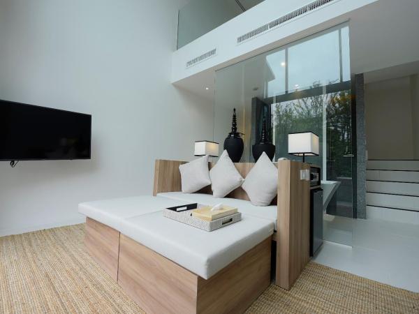 K Maison Lanna Boutique Hotel-SHA Plus Certified : photo 5 de la chambre hébergement dupex lanna