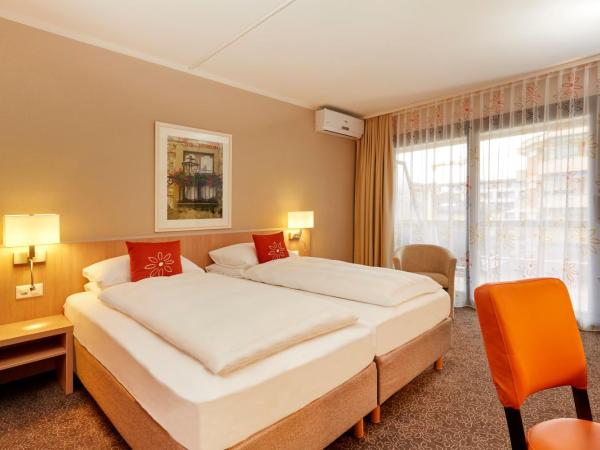 H4 Hotel Arcadia Locarno : photo 2 de la chambre chambre double supérieure