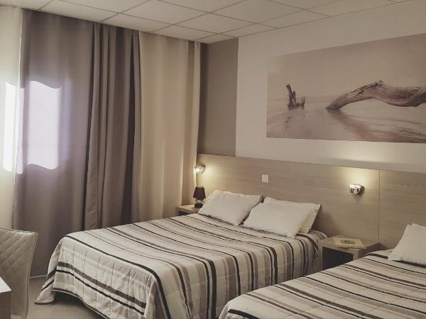 Logis Hôtel du Midi - Rodez Centre-Ville : photo 10 de la chambre chambre triple