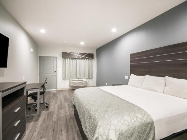 Americas Best Value Inn & Suites Northeast Houston I-610 : photo 7 de la chambre lit king-size