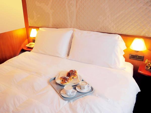 Hotel Giotto : photo 2 de la chambre chambre triple