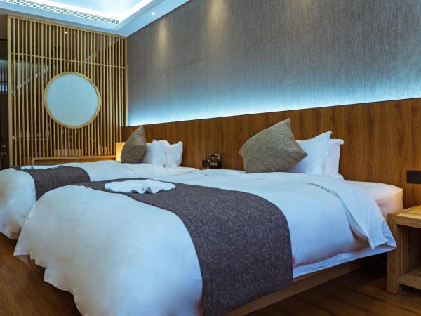 Lin Yin Art Hotel Shanghai(Pudong airport) : photo 6 de la chambre chambre lits jumeaux deluxe
