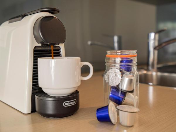 Silver Fern Rotorua Suites & Spa : photo 9 de la chambre studio supérieur avec piscine spa