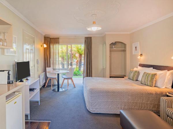 Silver Fern Rotorua Suites & Spa : photo 8 de la chambre studio supérieur avec piscine spa