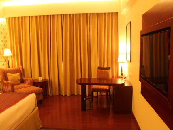 Ramada by Wyndham Jaipur Jaisinghpura : photo 6 de la chambre deluxe king room (non smoking)