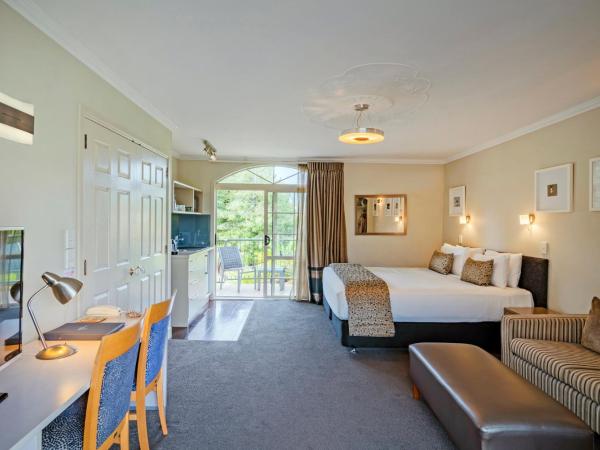 Silver Fern Rotorua Suites & Spa : photo 6 de la chambre studio exécutif avec piscine spa
