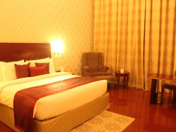 Ramada by Wyndham Jaipur Jaisinghpura : photo 7 de la chambre premium king room (non smoking)