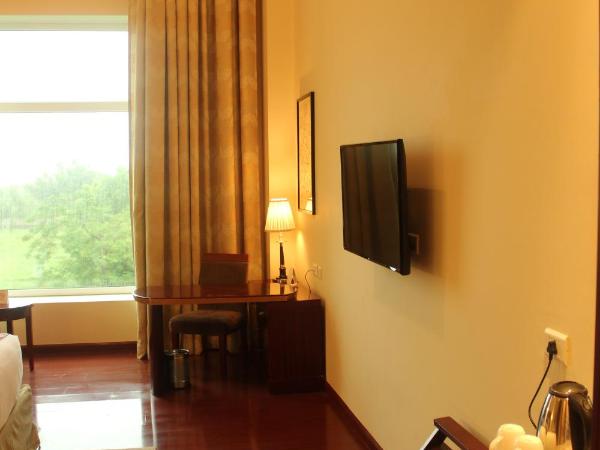 Ramada by Wyndham Jaipur Jaisinghpura : photo 4 de la chambre premium king room (non smoking)