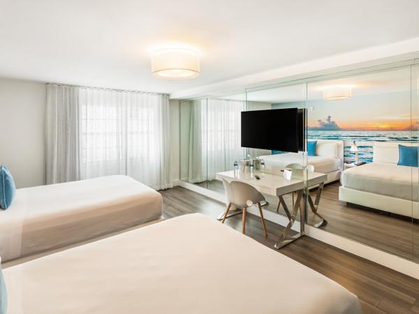 President Hotel : photo 4 de la chambre chambre de luxe villa avec 2 lits queen-size