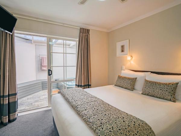 Silver Fern Rotorua Suites & Spa : photo 6 de la chambre executive one bedroom suite with spa pool