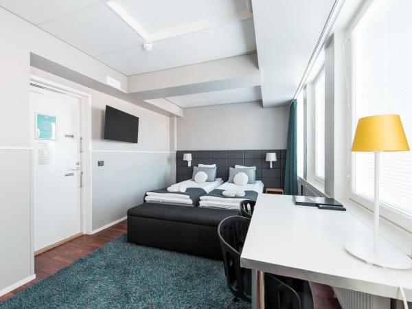 Forenom Aparthotel Helsinki Kamppi - contactless check-in : photo 1 de la chambre chambre lits jumeaux supérieure