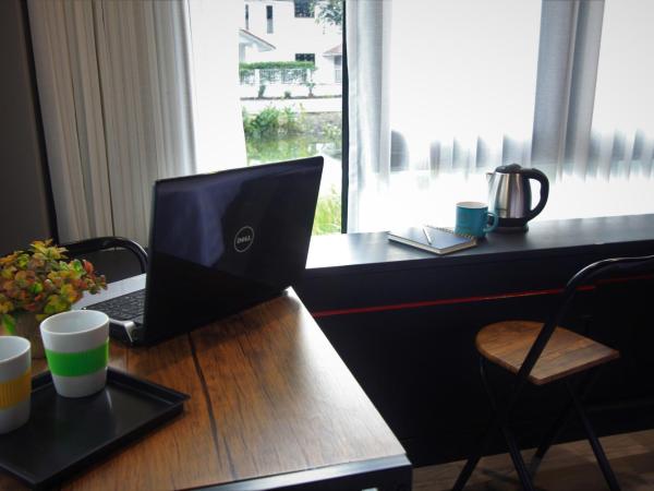 The Nichehome Waterside Living : photo 7 de la chambre chambre avec lit queen-size et salle de bains externe privative