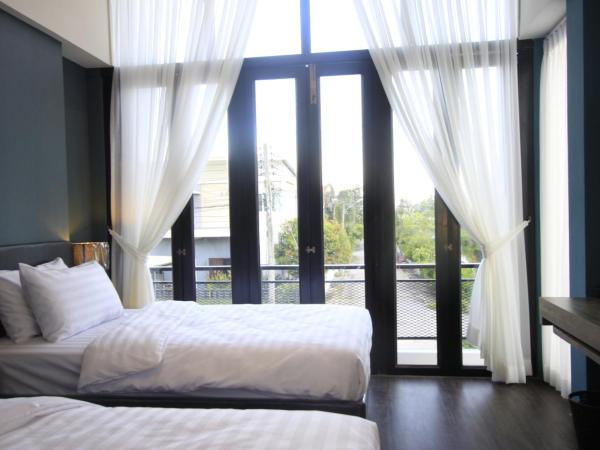 The Nichehome Waterside Living : photo 8 de la chambre chambre lits jumeaux standard avec vue sur jardin