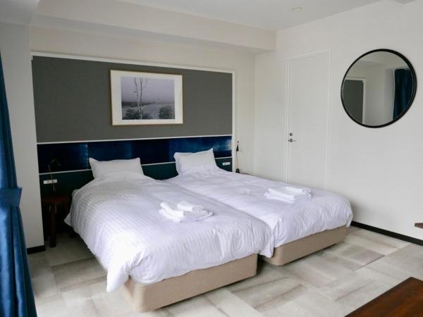 Tokyo Sakurako Hatchobori : photo 6 de la chambre chambre lits jumeaux deluxe