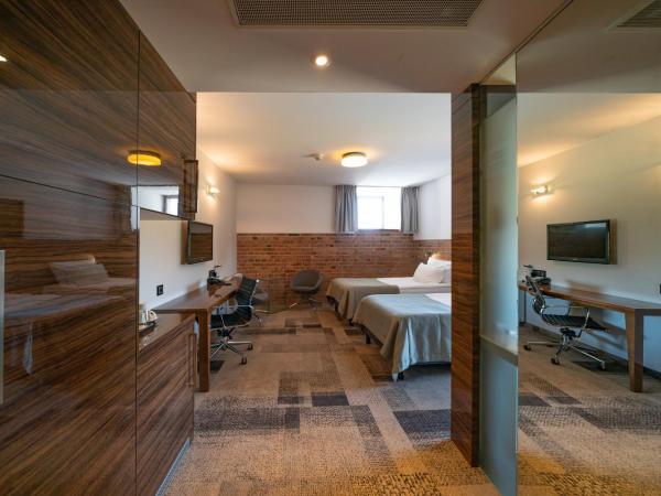 Q Hotel Grand Cru Gdańsk : photo 1 de la chambre chambre lits jumeaux