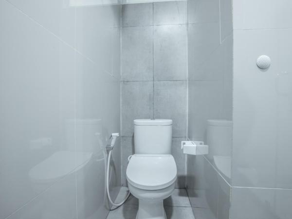 Super OYO 1487 Residence Khoe : photo 7 de la chambre chambre simple deluxe