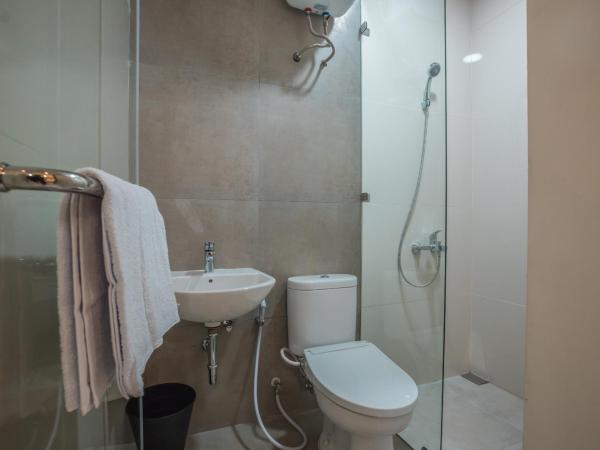 Super OYO 1487 Residence Khoe : photo 5 de la chambre chambre lits jumeaux supérieure