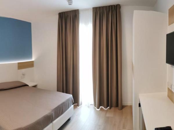 Almalux Jesolo Wellness & Spa 3 stelle superior : photo 1 de la chambre chambre quadruple confort
