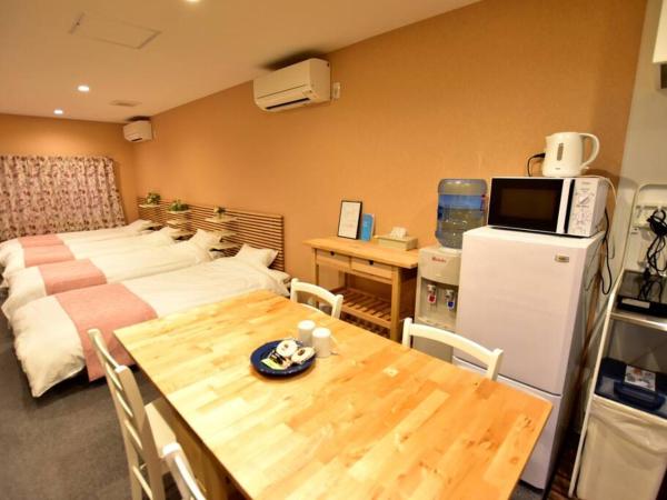 サクラストーリー : photo 3 de la chambre chambre familiale avec salle de bains privative