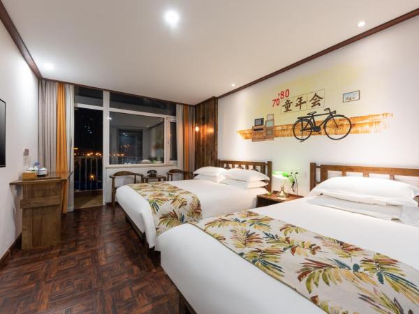 Time Traveller Hotel - Near Tianjin Polar Ocean World, Tianjin Fonte Joy World, 10 minutes drive away from Tianjin Tanggu High-Speed Railway Station, Free ice-cream, mineral water, snacks and laundry service, English communication well : photo 3 de la chambre chambre familiale