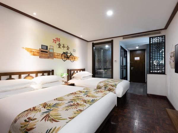 Time Traveller Hotel - Near Tianjin Polar Ocean World, Tianjin Fonte Joy World, 10 minutes drive away from Tianjin Tanggu High-Speed Railway Station, Free ice-cream, mineral water, snacks and laundry service, English communication well : photo 4 de la chambre chambre familiale