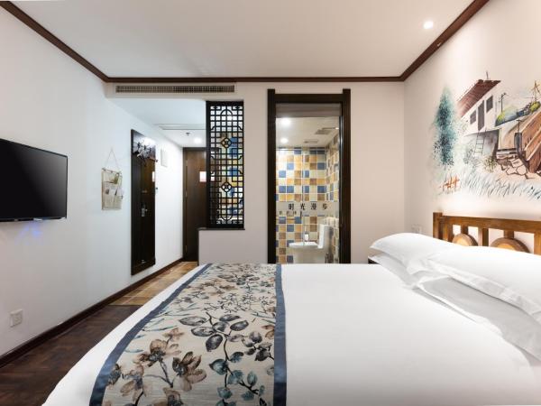 Time Traveller Hotel - Near Tianjin Polar Ocean World, Tianjin Fonte Joy World, 10 minutes drive away from Tianjin Tanggu High-Speed Railway Station, Free ice-cream, mineral water, snacks and laundry service, English communication well : photo 2 de la chambre chambre simple