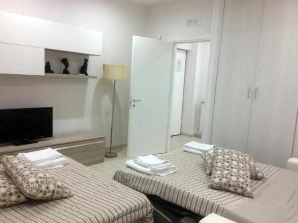 La casa di Donatella : photo 6 de la chambre chambre quadruple avec salle de bains commune