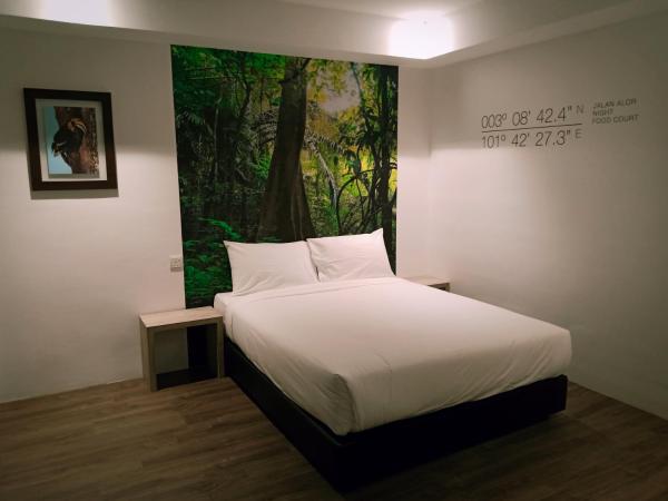 H Boutique Hotel Xplorer Loke Yew : photo 1 de la chambre chambre supérieure lit queen-size