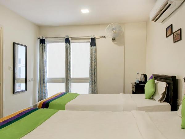 Treebo Srico : photo 6 de la chambre [sanitized] standard double room