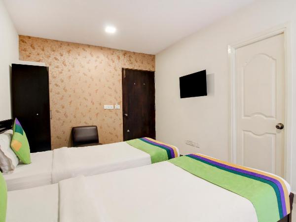 Treebo Srico : photo 7 de la chambre [sanitized] standard double room