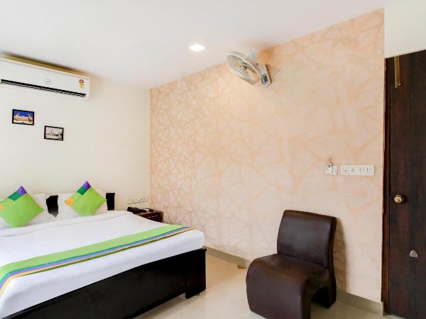 Treebo Srico : photo 8 de la chambre [sanitized] deluxe double room
