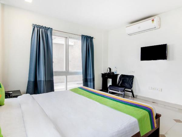 Treebo Srico : photo 9 de la chambre [sanitized] deluxe double room