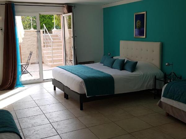 Les Bastides Saint Paul : photo 2 de la chambre chambre quadruple