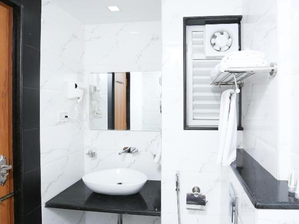 Treebo The Galaxy Chandapura : photo 9 de la chambre [sanitized] deluxe double room