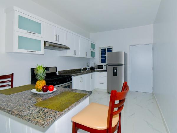 Rosil Place : photo 1 de la chambre appartement avec douche